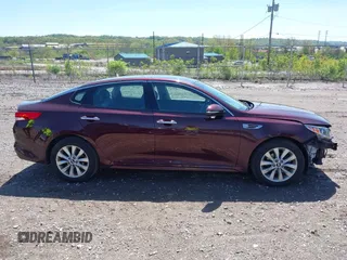 2016 Kia Optima EX z VIN 5XXGU4L37GG114750, wystawiony jako IAAI lot #42154903 z przebiegiem 97 625 mil mil oraz . Historia ofert i sprzedaży dostępna na DreamBid. Obrazek 14.