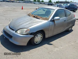 2000 Honda Insight z VIN JHMZE1357YT003654, wystawiony jako IAAI lot #42428076 z przebiegiem 173 445 mil mil oraz . Historia ofert i sprzedaży dostępna na DreamBid. Obrazek 2.