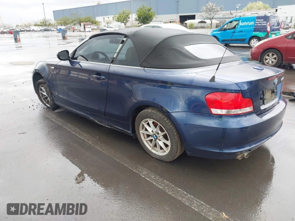 2010 BMW 1 Series 128i with VIN WBAUL7C58AVJ77695, listed as a IAAI auction lot 41938031 with Not provided miles and . Bid and sale history available at DreamBid. Image 3.