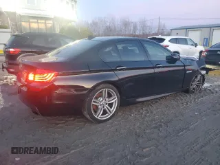 2016 BMW 5 Series 550i xDrive with VIN WBAKP9C52GD981190, listed as a Copart auction lot 85248244 with 90,962 mi miles and Salvage title. Bid and sale history available at DreamBid. Image 3.