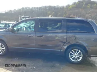 2015 Dodge Grand Caravan SXT with VIN 2C4RDGCG8FR541373, listed as a IAAI auction lot 41990500 with 114,100 mi miles and . Bid and sale history available at DreamBid. Image 14.