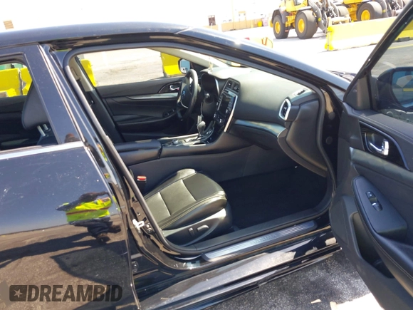 2021 Nissan Maxima SV with VIN 1N4AA6CV4MC506744, listed as a IAAI auction lot 42150465 with 70,056 mi miles and . Bid and sale history available at DreamBid. Image 5.