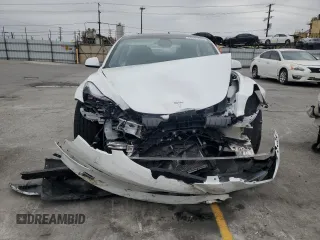 2023 Tesla Model 3 z VIN 5YJ3E1EA1PF561521, wystawiony jako Copart lot #55637855 z przebiegiem 83 008 mil mil oraz Szkoda całkowita • Salvage title. Historia ofert i sprzedaży dostępna na DreamBid. Obrazek 5.