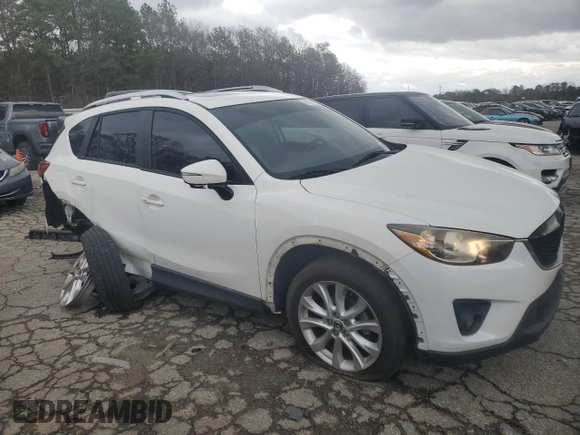 2015 Mazda CX-5 Grand Touring with VIN JM3KE2DY6F0504784, listed as a Copart auction lot 47671705 with 174,682 mi miles and Salvage Title. Bid and sale history available at carsss.com. Image 4.