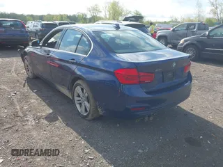 2017 BMW 3 Series 330i xDrive with VIN WBA8D9C32HA005561, listed as a IAAI auction lot 42161234 with Not provided miles and . Bid and sale history available at DreamBid. Image 3.