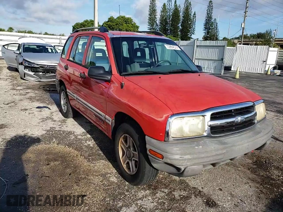 2003 Chevrolet Tracker with VIN 2CNBE13CX36943395, listed as a Copart auction lot 70964574 with 118,975 mi miles and Salvage title. Bid and sale history available at DreamBid. Image 12.