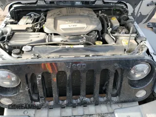 2015 Jeep Wrangler Unlimited Willys Wheeler with VIN 1C4BJWDG7FL690952, listed as a Copart auction lot 51493715 with 45,497 mi miles and Salvage Title. Bid and sale history available at DreamBid. Image 13.