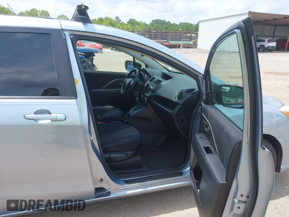 2012 Mazda 5 Sport with VIN JM1CW2BLXC0106748, listed as a IAAI auction lot 42435965 with 153,786 mi miles and . Bid and sale history available at DreamBid. Image 5.