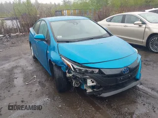 2022 Toyota Prius LE z VIN JTDKAMFPXN3198643, wystawiony jako IAAI lot #42163069 z przebiegiem 17 372 mil mil oraz . Historia ofert i sprzedaży dostępna na DreamBid. Obrazek 1.