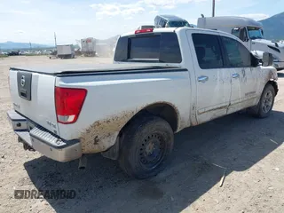 2007 Nissan Titan LE with VIN 1N6AA07B27N214751, listed as a IAAI auction lot 42325152 with 174,765 mi miles and . Bid and sale history available at DreamBid. Image 4.