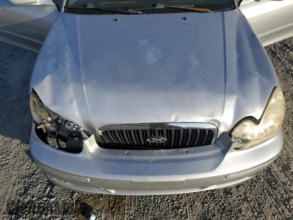 2005 Hyundai Sonata GLS with VIN KMHWF35H95A116657, listed as a Copart auction lot 77614154 with 101,164 mi miles and Salvage Title. Bid and sale history available at carsss.com. Image 12.