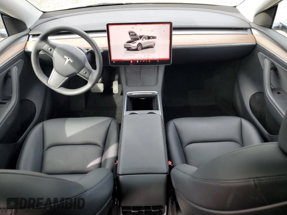 2023 Tesla Model Y Long Range with VIN 7SAYGDEE6PA101291, listed as a Copart auction lot 52758115 with 7,250 mi miles and Salvage Title. Bid and sale history available at DreamBid. Image 8.