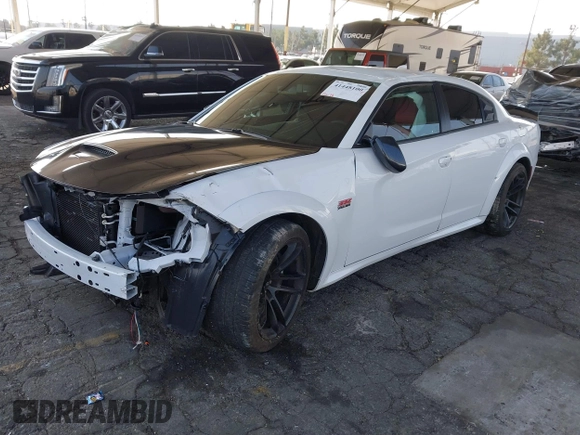 2023 Dodge Charger Scat Pack Widebody with VIN 2C3CDXGJ6PH635498, listed as a IAAI auction lot 41448100 with 13,678 mi miles and . Bid and sale history available at DreamBid. Image 18.
