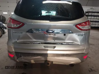 2015 Ford Escape Titanium z VIN 1FMCU9J96FUB23902, wystawiony jako IAAI lot #42497188 z przebiegiem 164 452 mil mil oraz . Historia ofert i sprzedaży dostępna na DreamBid. Obrazek 6.