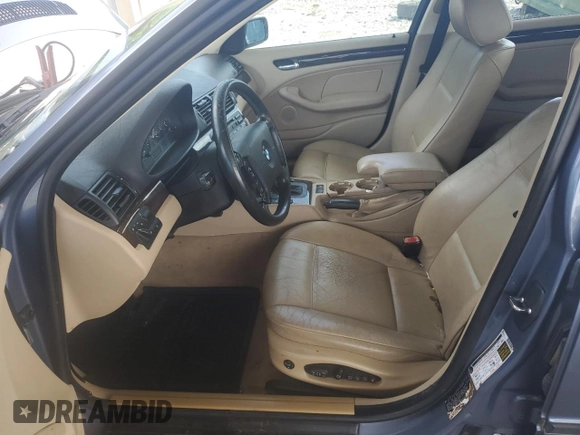 2005 BMW 3 Series 325i with VIN WBAEV33415KX10041, listed as a Copart auction lot 61673545 with 117,294 mi miles and Salvage title. Bid and sale history available at DreamBid. Image 7.