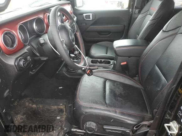 2023 Jeep Gladiator Rubicon with VIN 1C6JJTBG7PL573197, listed as a Copart auction lot 53866075 with 19,521 mi miles and Salvage title. Bid and sale history available at DreamBid. Image 7.