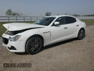 2017 Maserati Ghibli with VIN ZAM57XSA6H1233933, listed as a Copart auction lot 49089525 with 76,965 mi miles and Salvage Title. Bid and sale history available at carsss.com. Image 1.