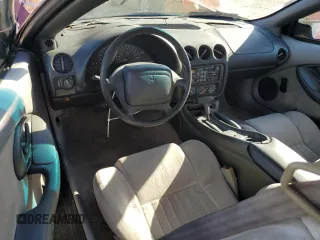 1995 Pontiac Firebird Firebird z VIN 2G2FS22S3S2240907, wystawiony jako Copart lot #77215444 z przebiegiem 111 636 mil mil oraz Szkoda całkowita • Salvage title. Historia ofert i sprzedaży dostępna na DreamBid. Obrazek 8.