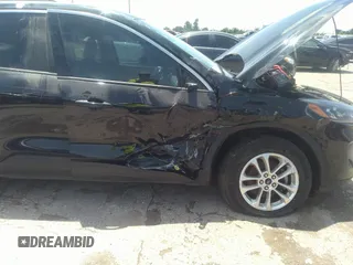 2020 Ford Escape SE with VIN 1FMCU0G61LUB77189, listed as a IAAI auction lot 42223410 with 101,407 mi miles and . Bid and sale history available at DreamBid. Image 6.