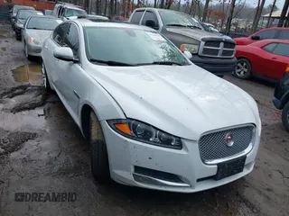 2014 Jaguar XF V6 SC with VIN SAJWJ0EF9E8U32052, listed as a IAAI auction lot 41542500 with 74,550 mi miles. Bid and sale history available at carsss.com. Image 1.