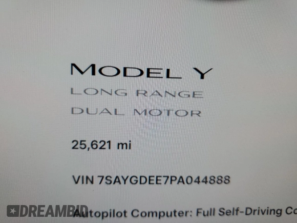 2023 Tesla Model Y Long Range with VIN 7SAYGDEE7PA044888, listed as a Copart auction lot 48538335 with 25,621 mi miles and Salvage Title. Bid and sale history available at DreamBid. Image 9.