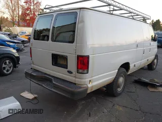 2000 Ford Econoline Cargo with VIN 1FTNS2422YHB94809, listed as a IAAI auction lot 40999427 with 154,779 mi miles and . Bid and sale history available at DreamBid. Image 4.
