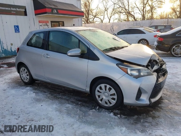 2015 Toyota Yaris L with VIN VNKJTUD36FA036518, listed as a IAAI auction lot 41233406 with 138,481 mi miles. Bid and sale history available at carsss.com. Image 1.