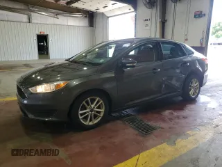 2016 Ford Focus SE z VIN 1FADP3F23GL396771, wystawiony jako Copart lot #64773955 z przebiegiem 81 761 mil mil oraz Szkoda całkowita • Salvage title. Historia ofert i sprzedaży dostępna na DreamBid. Obrazek 1.