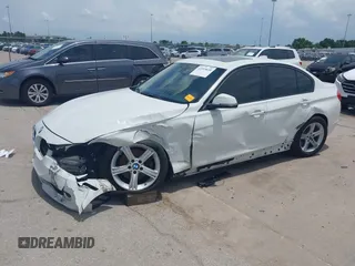 2013 BMW 3 Series 320i with VIN WBA3B1C50DK129576, listed as a IAAI auction lot 42393038 with 160,370 mi miles and . Bid and sale history available at DreamBid. Image 18.
