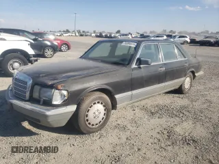 1988 Mercedes-Benz 420 Series 420SEL with VIN WDBCA35D5JA388327, listed as a Copart auction lot 74394414 with 299,950 mi miles and Salvage Title. Bid and sale history available at carsss.com. Image 1.