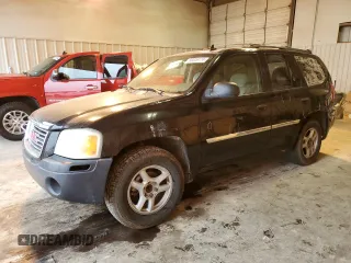 2007 GMC Envoy SLE with VIN 1GKDS13S672297700, listed as a Copart auction lot 86006174 with 116,848 mi miles and Salvage Title. Bid and sale history available at carsss.com. Image 1.