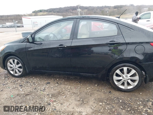 2013 Hyundai Accent GLS with VIN KMHCU4AE9DU379870, listed as a IAAI auction lot 41534029 with 102,610 mi miles. Bid and sale history available at carsss.com. Image 14.