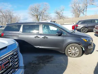 2021 Kia Sedona EX with VIN KNDMB5C19M6671229, listed as a IAAI auction lot 41066675 with 168,393 mi miles. Bid and sale history available at carsss.com. Image 13.