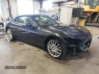 2015 Maserati GranTurismo Convertible Sport with VIN ZAM45MMA5F0141129, listed as a IAAI auction lot 41538585 with 11,267 mi miles. Bid and sale history available at carsss.com. Image 1.