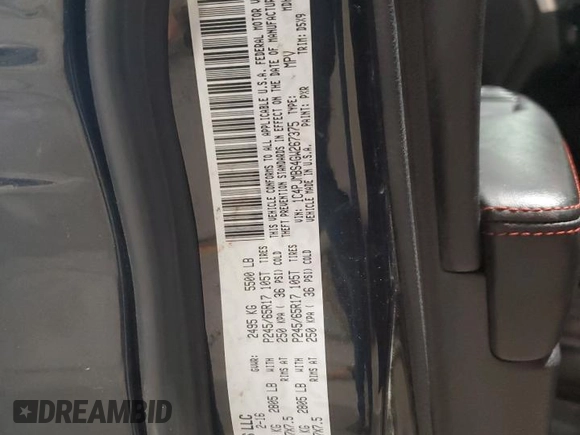 2016 Jeep Cherokee Trailhawk with VIN 1C4PJMBS4GW267375, listed as a Copart auction lot 58476005 with 116,151 mi miles and Salvage title. Bid and sale history available at DreamBid. Image 13.