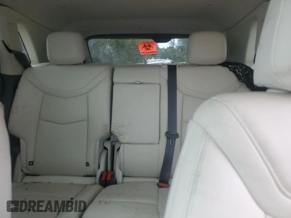 2022 Cadillac XT5 FWD Premium Luxury z VIN 1GYKNCRS5NZ174787, wystawiony jako Copart lot #47541075 z przebiegiem 31 357 mil mil oraz Szkoda całkowita • Salvage title. Historia ofert i sprzedaży dostępna na DreamBid. Obrazek 10.