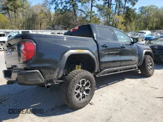 2024 GMC Canyon 4WD AT4X with VIN 1GTP6EEK7R1133432, listed as a Copart auction lot 49871295 with Not Provided miles and Salvage Title. Bid and sale history available at carsss.com. Image 3.