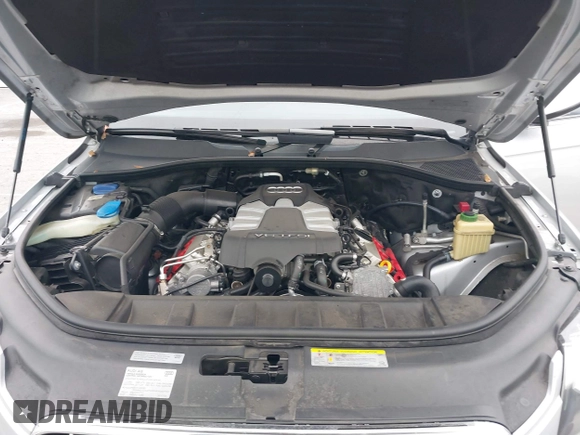 2014 Audi Q7 Premium Plus with VIN WA1LGAFE2ED017135, listed as a IAAI auction lot 42533428 with 142,132 mi miles and . Bid and sale history available at DreamBid. Image 10.