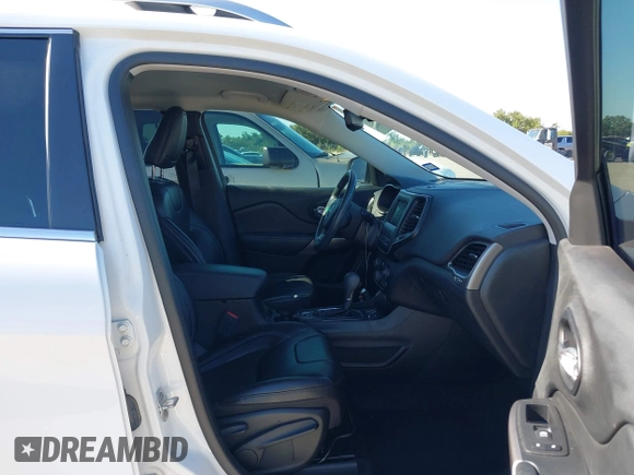 2021 Jeep Cherokee Altitude with VIN 1C4PJLLB5MD173828, listed as a IAAI auction lot 42234912 with 66,400 mi miles and . Bid and sale history available at DreamBid. Image 5.