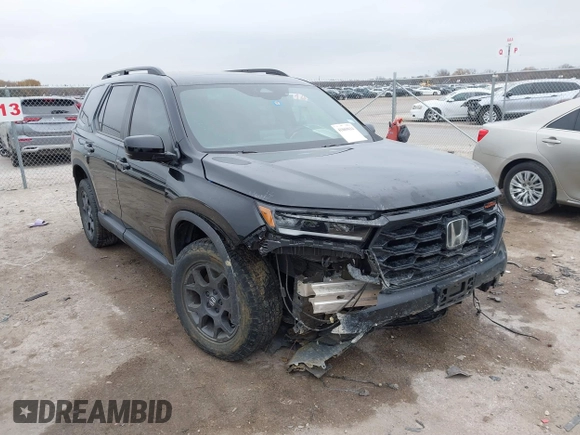 2023 Honda Pilot TrailSport with VIN 5FNYG1H63PB051646, listed as a IAAI auction lot 41069614 with 28,730 mi miles. Bid and sale history available at carsss.com. Image 1.