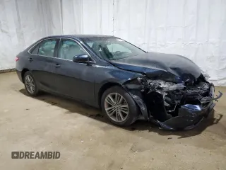2015 Toyota Camry XLE with VIN 4T1BF1FK3FU077674, listed as a Copart auction lot 52679985 with 128,417 mi miles and Salvage Title. Bid and sale history available at DreamBid. Image 4.