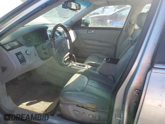 2006 Cadillac DTS 1SE with VIN 1G6KD57956U189859, listed as a Copart auction lot 89266305 with 153,549 mi miles and Salvage Title. Bid and sale history available at DreamBid. Image 7.