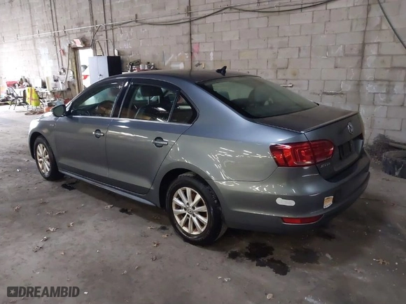 2013 Volkswagen Jetta Sedan Hybrid SE with VIN 3VW637AJ4DM268776, listed as a IAAI auction lot 39229918 with 167,870 mi miles. Bid and sale history available at carsss.com. Image 3.