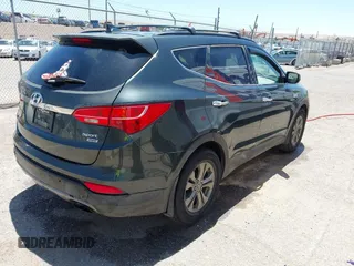 2014 Hyundai Santa Fe with VIN 5XYZUDLB9EG169614, listed as a IAAI auction lot 42208166 with 139,103 mi miles and . Bid and sale history available at DreamBid. Image 4.