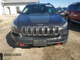 2014 Jeep Cherokee Trailhawk with VIN 1C4PJMBS1EW161642, listed as a Copart auction lot 46672345 with 196,908 mi miles and Salvage Title. Bid and sale history available at carsss.com. Image 5.