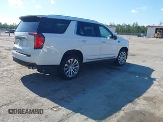 2023 GMC Yukon Denali with VIN 1GKS1DKL2PR303909, listed as a IAAI auction lot 42018679 with 65,532 mi miles. Bid and sale history available at carsss.com. Image 4.