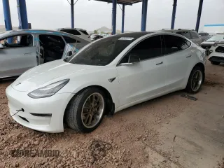 2020 Tesla Model 3 Long Range with VIN 5YJ3E1EB4LF637428, listed as a Copart auction lot 48926225 with 121,089 mi miles and Salvage Title. Bid and sale history available at carsss.com. Image 1.