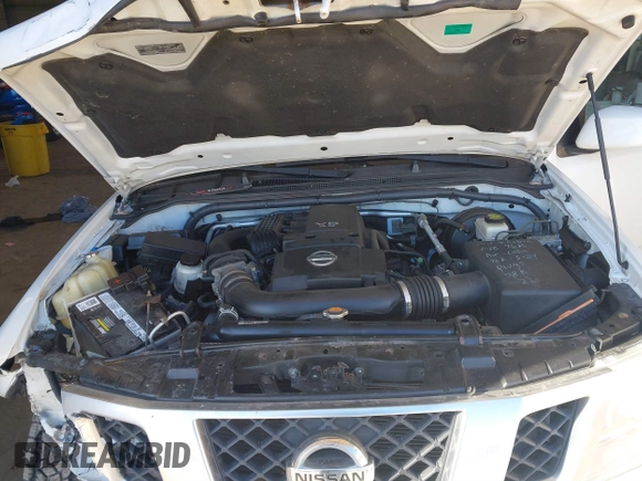 2014 Nissan Frontier SV with VIN 1N6AD0EV4EN736220, listed as a IAAI auction lot 41241823 with 91,789 mi miles and . Bid and sale history available at DreamBid. Image 10.