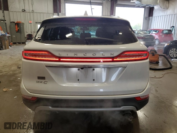 2019 Lincoln MKC Select with VIN 5LMCJ2D90KUL25654, listed as a Copart auction lot 56461185 with 56,296 mi miles and Salvage title. Bid and sale history available at DreamBid. Image 6.