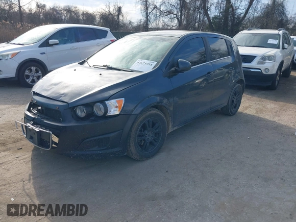 2014 Chevrolet Sonic LT with VIN 1G1JC6SG6E4121407, listed as a IAAI auction lot 41671918 with 137,517 mi miles. Bid and sale history available at carsss.com. Image 2.